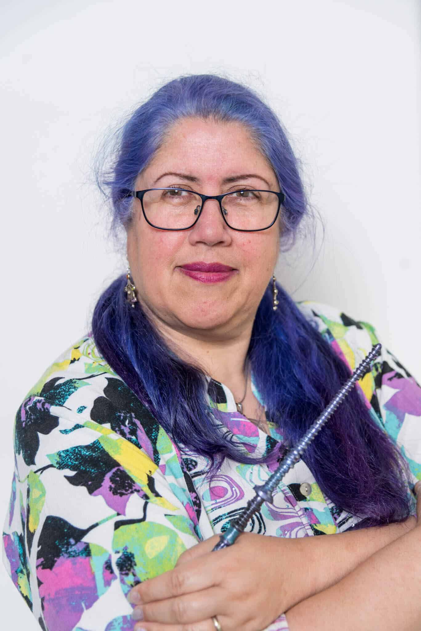 Karen Leslie arms crossed with wand